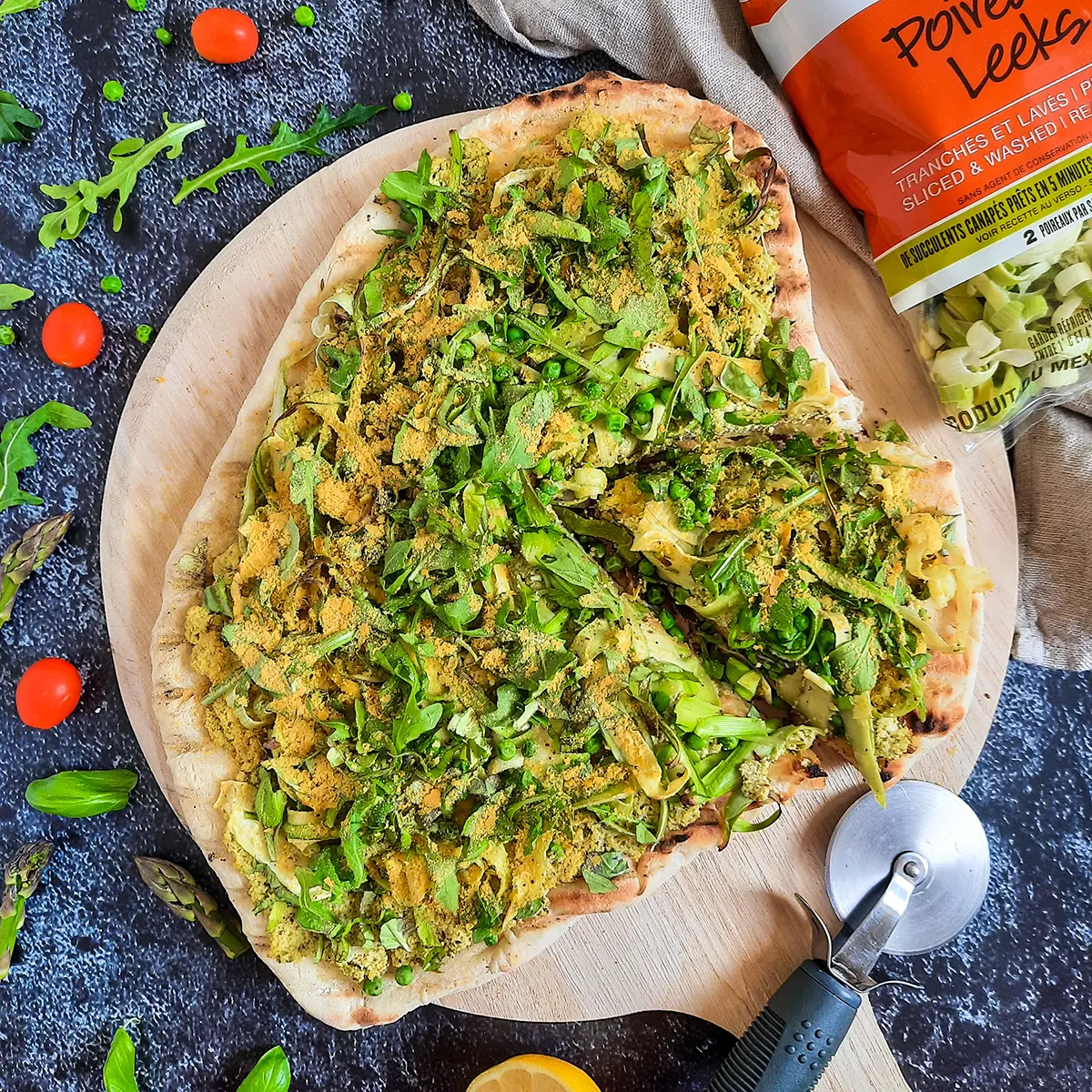 Green BBQ pizza with asparagus ricotta and leeks