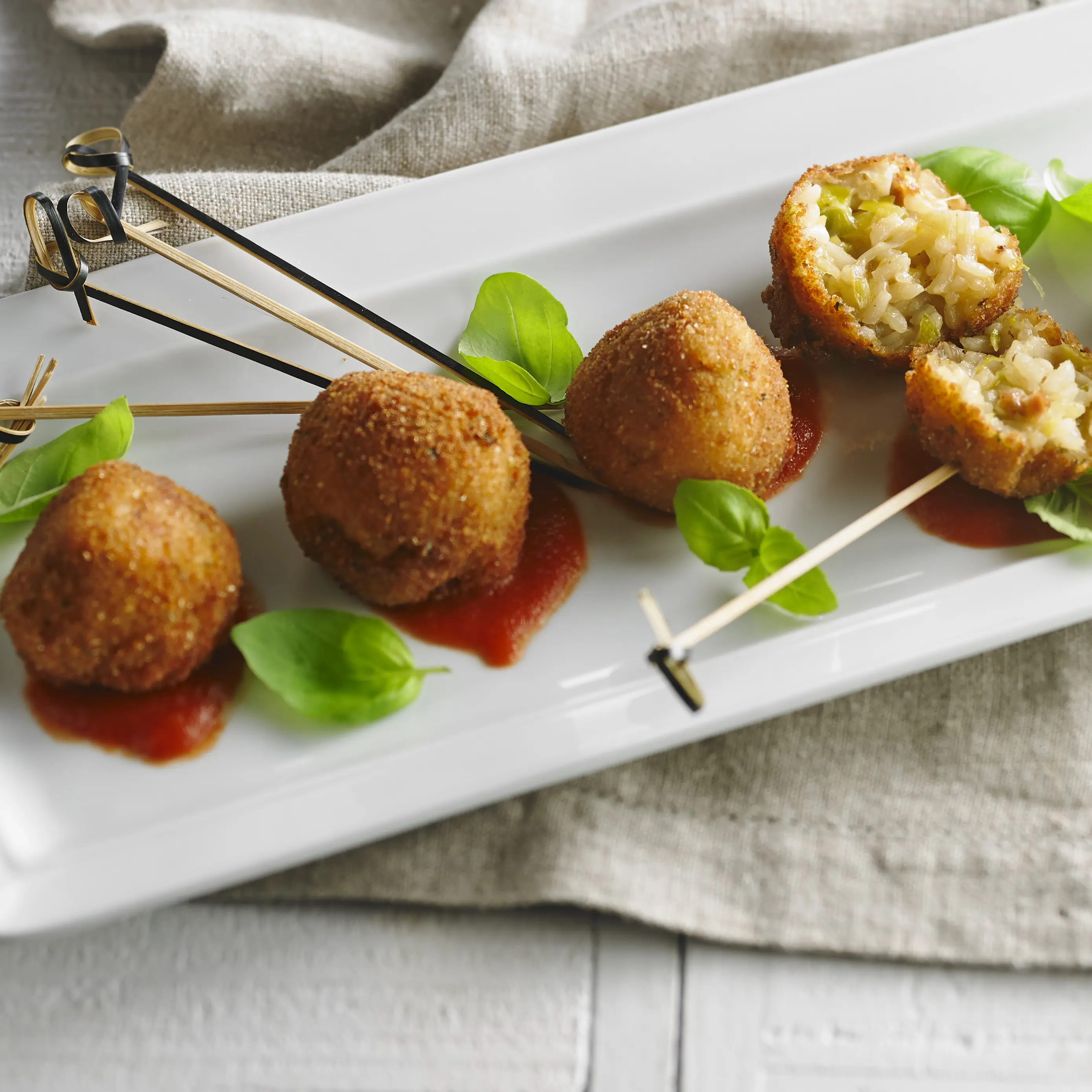 Sausage arancini with leeks