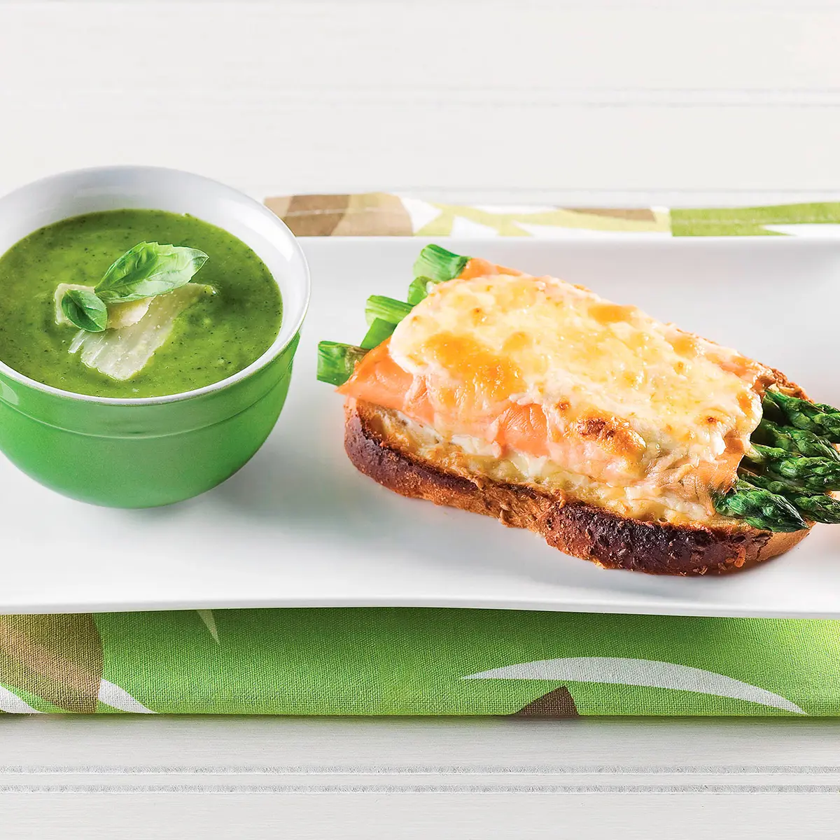 Croque-asparagus with smoked trout and two cheese sauce