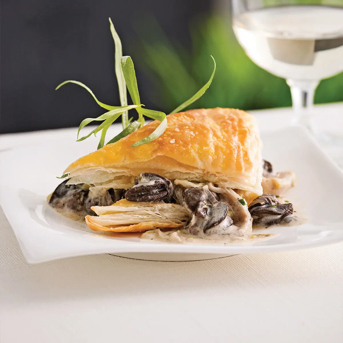 Snails puff pastry with leeks and oyster mushrooms