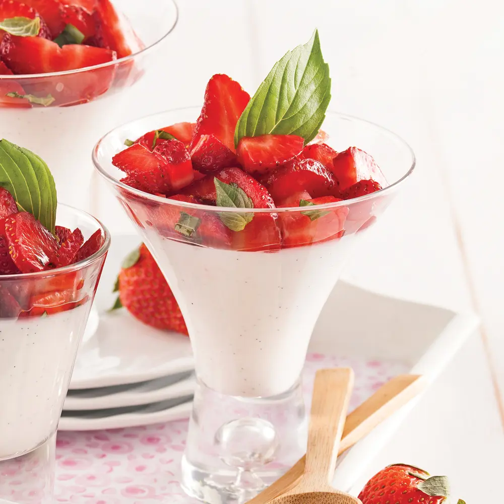 Panna cotta with coconut milk, strawberries and Thai basil
